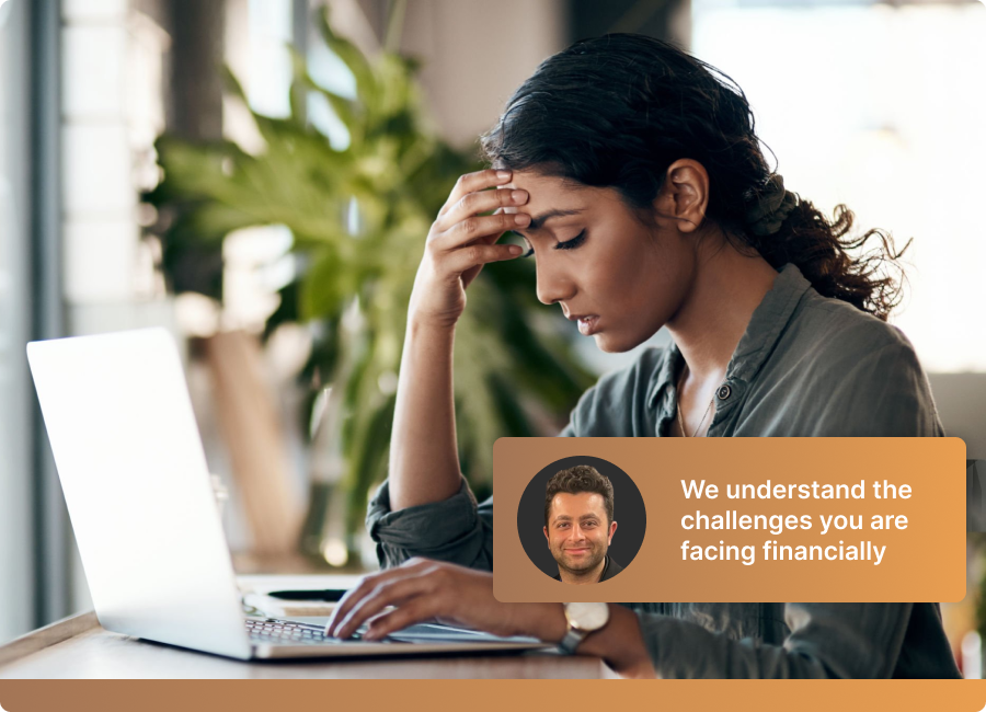Small business owner stressed over financial paperwork